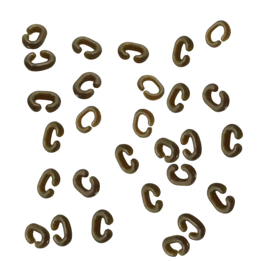 Dark green Drop Off Safety Clips for Heli/Chod rigs, durable fish-safe design.